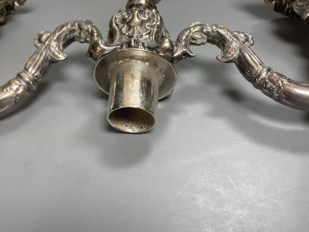 A silver plated twin light candelabrum, rococo style, hollow construction, 41cm high